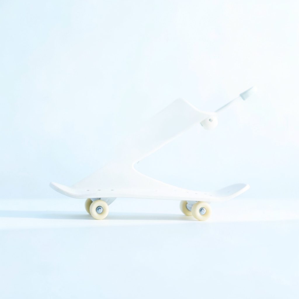 Soft daylight over a smooth pale gray tabletop, light pastel-blue accents, minimal and airy mood